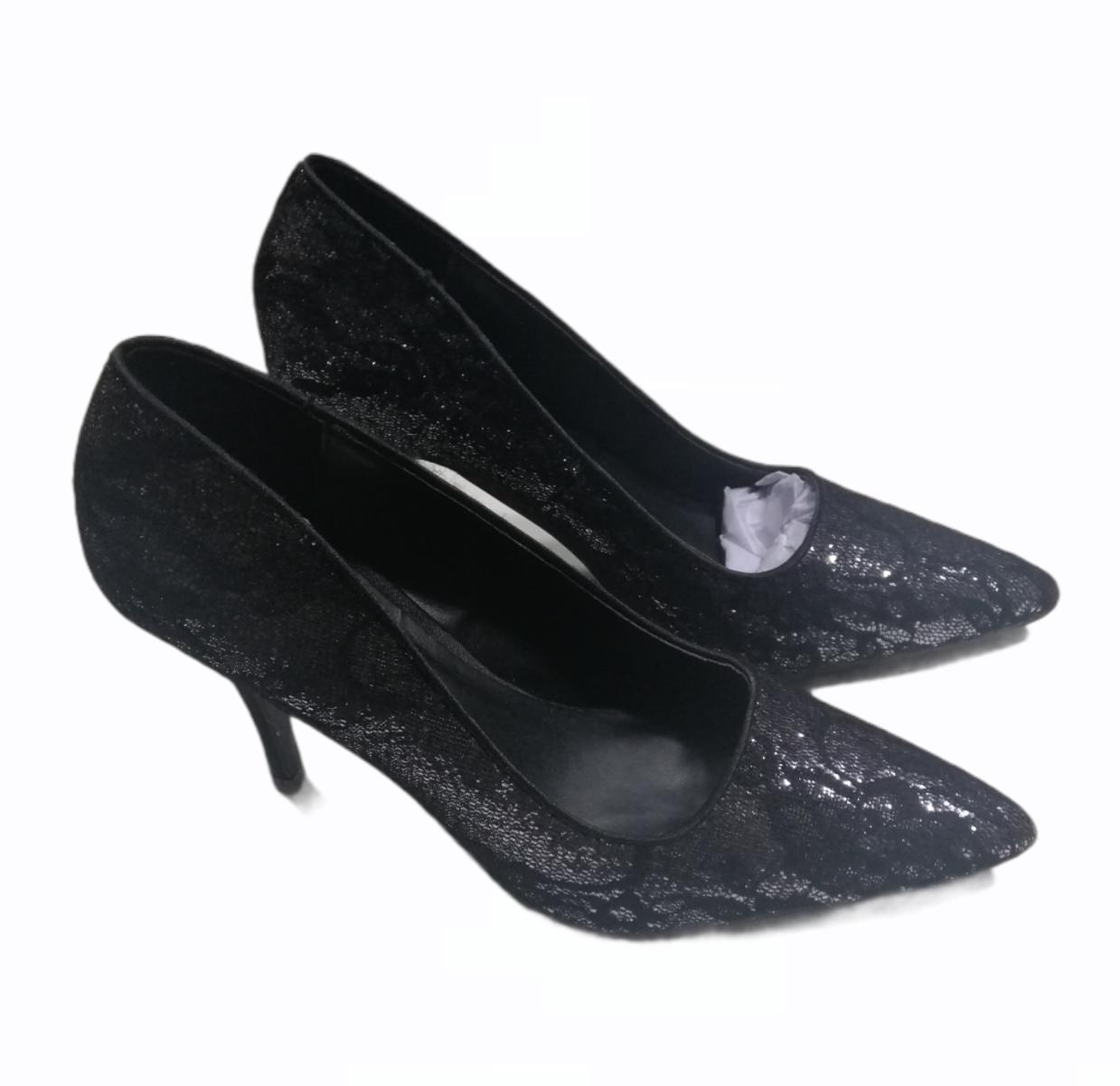 Chaussure brillante à talons